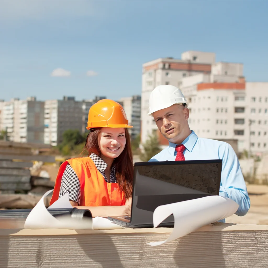 portrait two builders building site.jpg